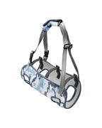 The blue camo full-body harness: vest with four leg openings, handle on top